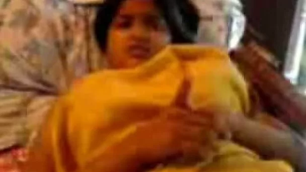 Indian young sweetheart with big boobs filmed in the bed