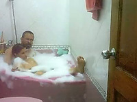 Chunky Indian housewife with her hubby in the bathtub