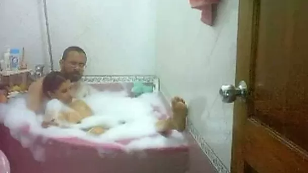 Chunky Indian housewife with her hubby in the bathtub