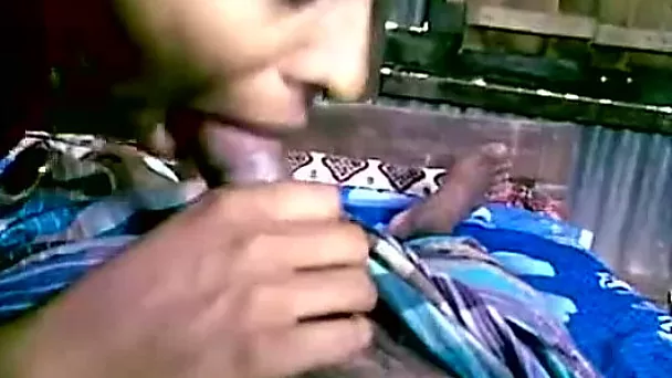 Playful dark skin village girl gives head to her boyfriend