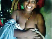 Naughty amateur Indian man plays with huge saggy boobies of his wife