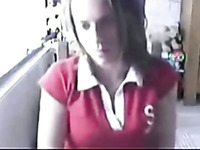 Slutty brunette webcam chick pulls up her T-shirt to show tits