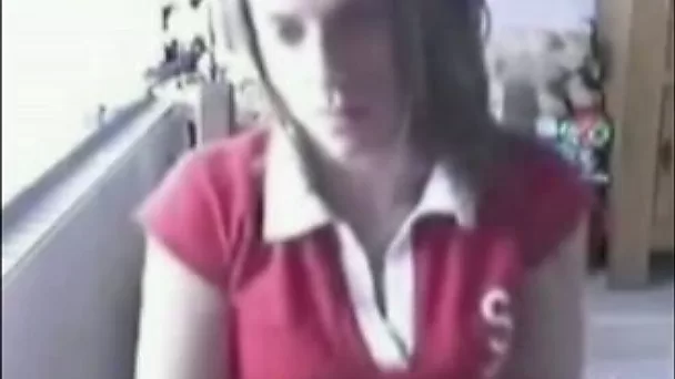 Slutty brunette webcam chick pulls up her T-shirt to show tits