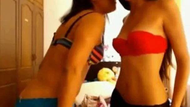 Two slutty slender and sexy brunette cam girls please me with strip show