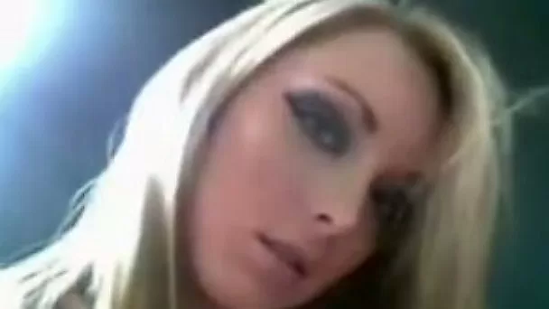Mesmerizing blonde beauty has a small purple plastic toy