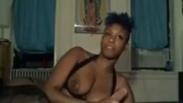Busty hot ebony babe blowing white dick on cam in his bedroom