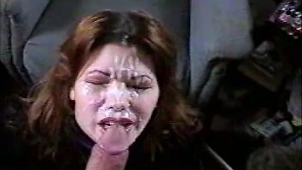 Sultry brown haired secretary gives handjob and takes messy facial