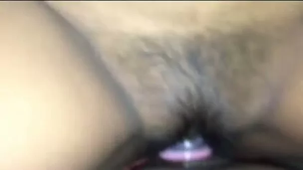 Drilling my Indian girlfriend's hairy pussy in a missionary position