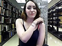 Perverted librarian shows off her juicy nipples