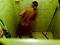 Spy cam vid of taking a shower all natural light haired bitch