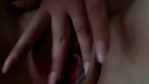 My sweet girlfriend is playing with her charming pussy