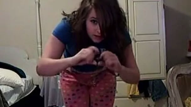 Adorable teen gal takes clothes off in front of camera