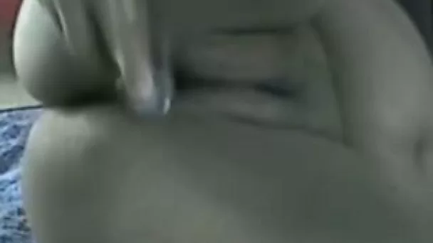 Chubby mature woman poking her twat with dildo