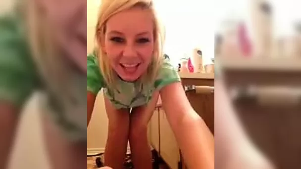 Lovely blonde gal with big boobs posing for me on webcam