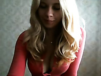 Blonde Barbie doll showing her goodies on webcam
