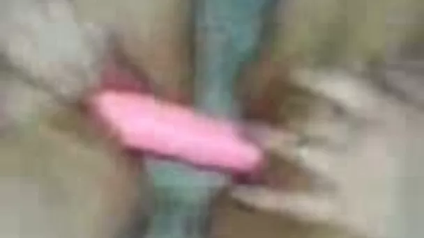 Aroused brunette wife shares double ended dildo with her girl friend