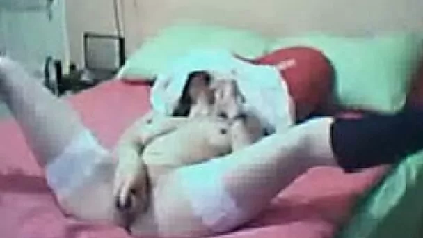 My shy Turkish babe masturbates her cunt with a sheet on her face