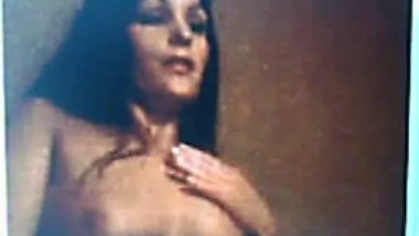 Black haired busty diva rubs her cunt and big boobs on cam