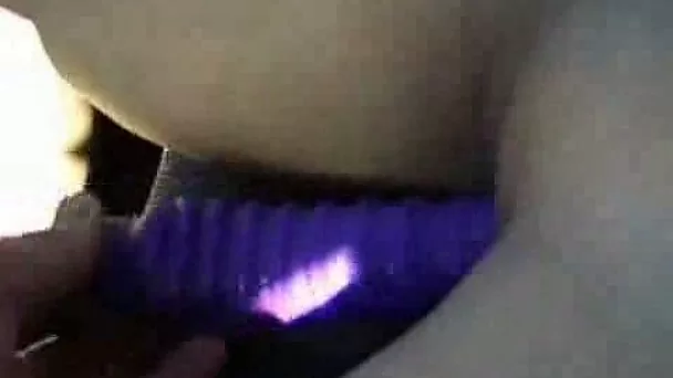 Shameless wife drives the car while petting her pussy with dildo