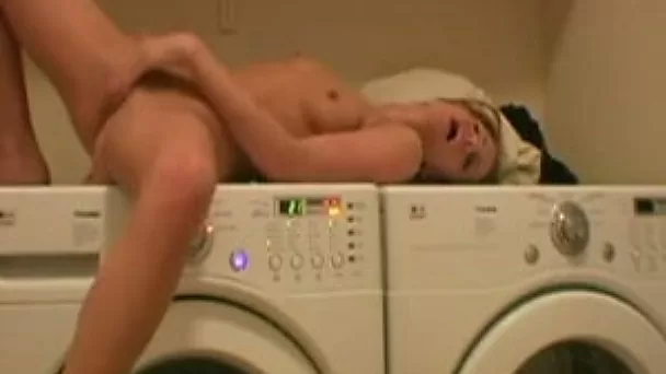 Playful girlfriend with svelte natural body masturbating on a washing machine