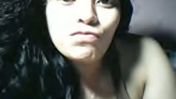 Gorgeous Filipina girl flashing her titties on webcam