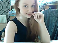 Pale skinned redhead fingering her ass hole on webcam