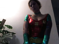 Beautiful and sexy babe posing for me in superman costume