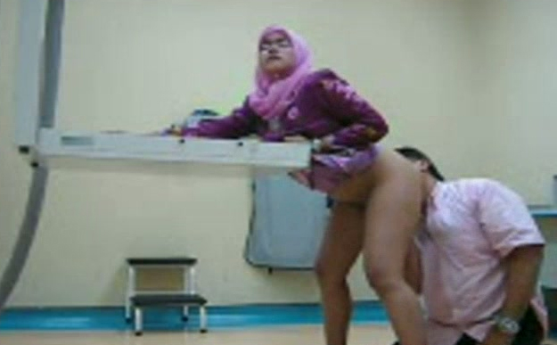 Happy office man rims his Malay wife and fucks her on the table pic