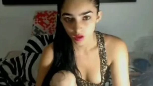 Charming brunette girl with appetizing tits posing for me on webcam