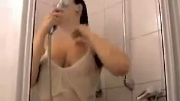 Playful and kinky girlfriend rubbing her sexy body in a bathroom