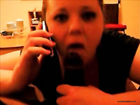 Chubby white lady eats big black dick and talks on the phone