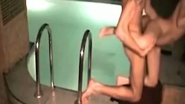 Dude in his private pool with his beautiful young girlfriend