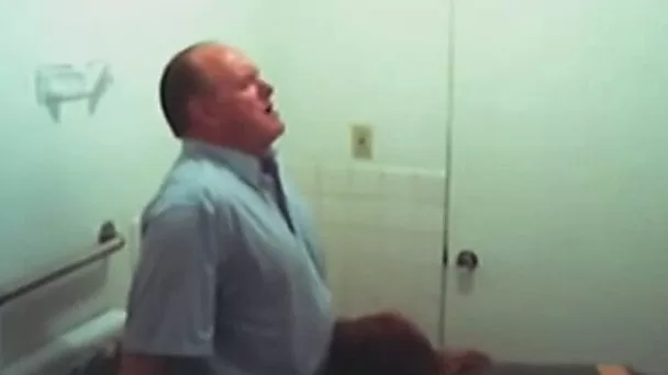 Chubby mature guy getting blowjob in the public restroom