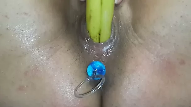 My ex girlfriend stuffs her shaved cunt with a banana