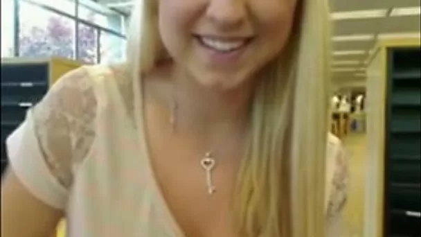 Blonde nympho flashed her pussy and teased it in the library