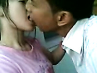 Lewd Asian couple kisses and spoons in a bit shy way on camera