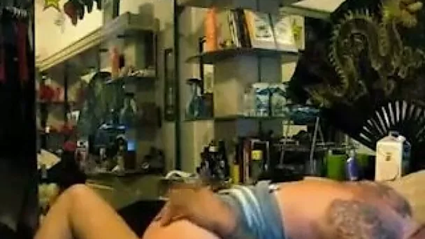 Slutty big bottomed bitch is fucked by her tattooed man on webcam