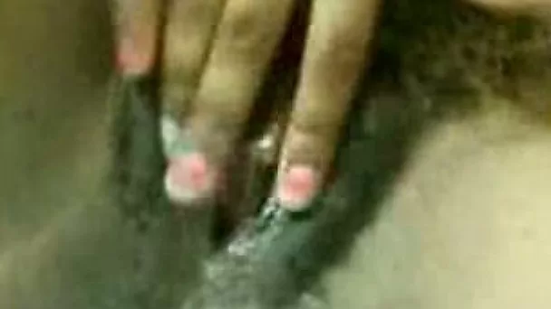 Jamaican BBW ebony wife rubs her meaty hairy cooch