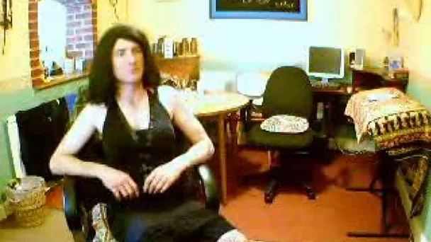 Buff crossdresser shows off his sissy dresses and lingerie