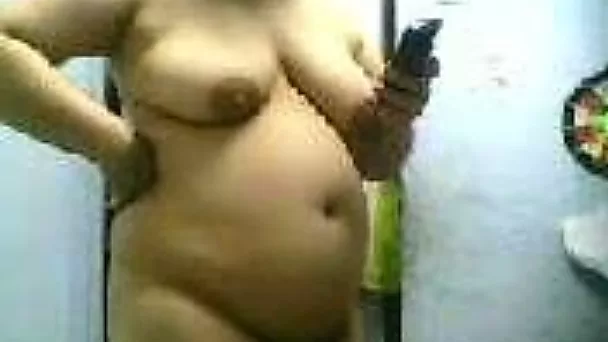 My fat and horny mature slut naked showing off big juggs
