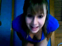 Cute blonde teenie in her panties and T-shirt playing on webcam