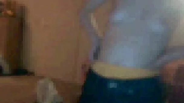 Pale skin mature slut form UK shows me her saggy rack on webcam