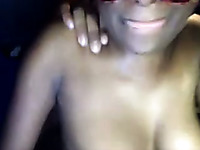 Hilarious masked black chick brags off her big saggy boobies on webcam