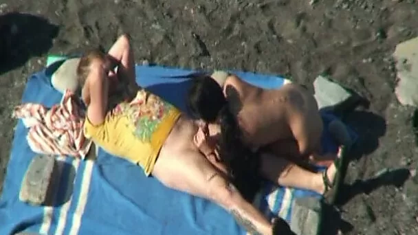 Slender brunette girl eats dick and rides it on the beach