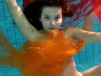 Sweet and naughty European teen spinner under water
