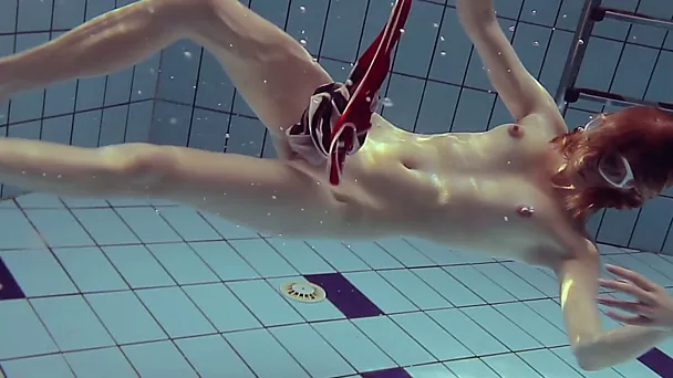Amazing redhead Russian young chick in bathing suit