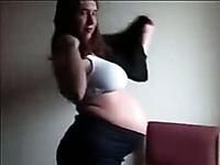My sexy pregnant wife posing on camera in underwear