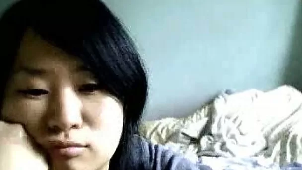 Cute Asian girlfriend from Tokyo flashes her round butt on webcam