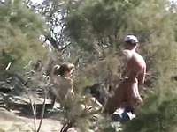 Horny and naked random people in the bushes at the beach