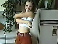 Young Russian pale skin girlfriend strips and masturbates in kitchen
